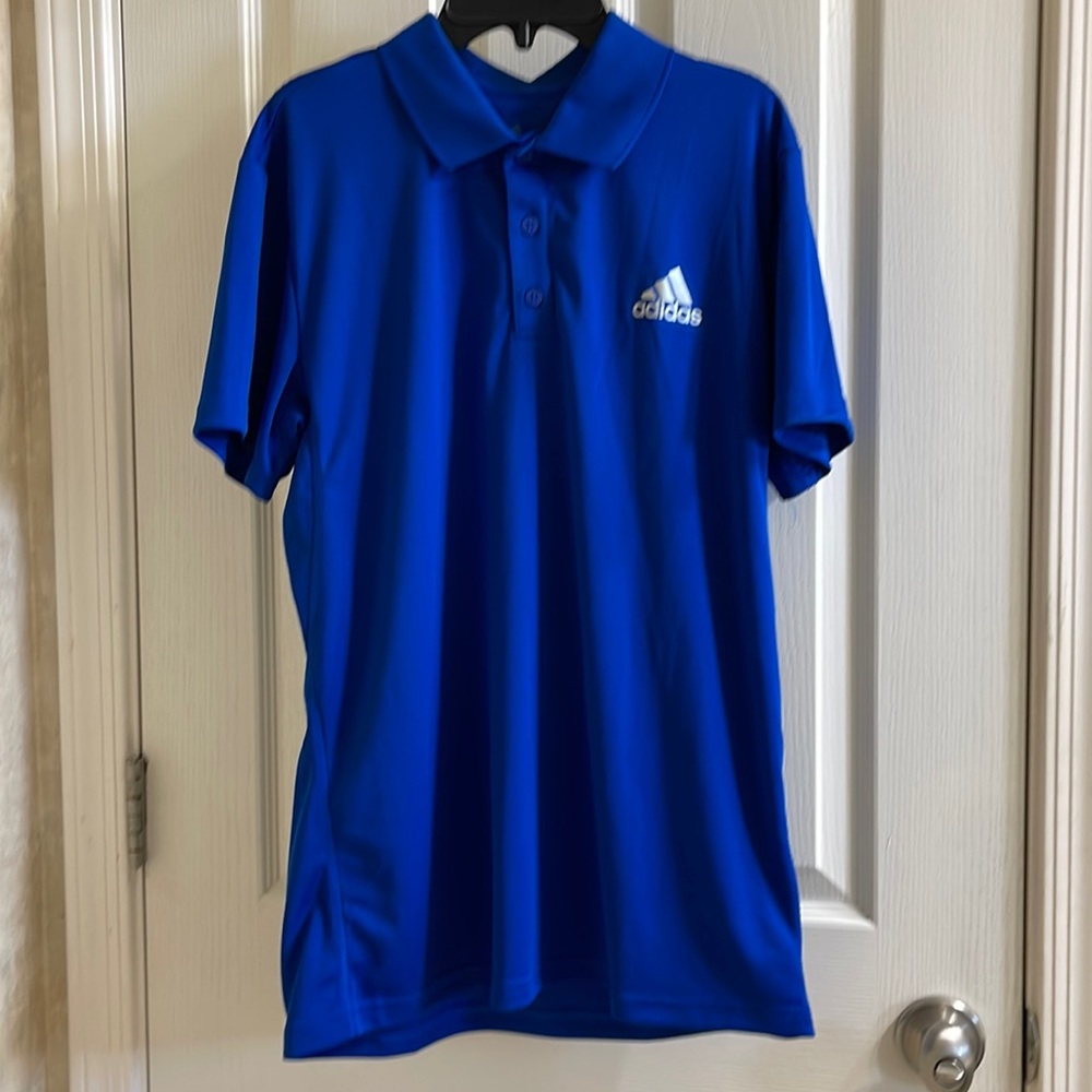 Brand new men’s Adidas polo/golf shirt, size medium, royal blue